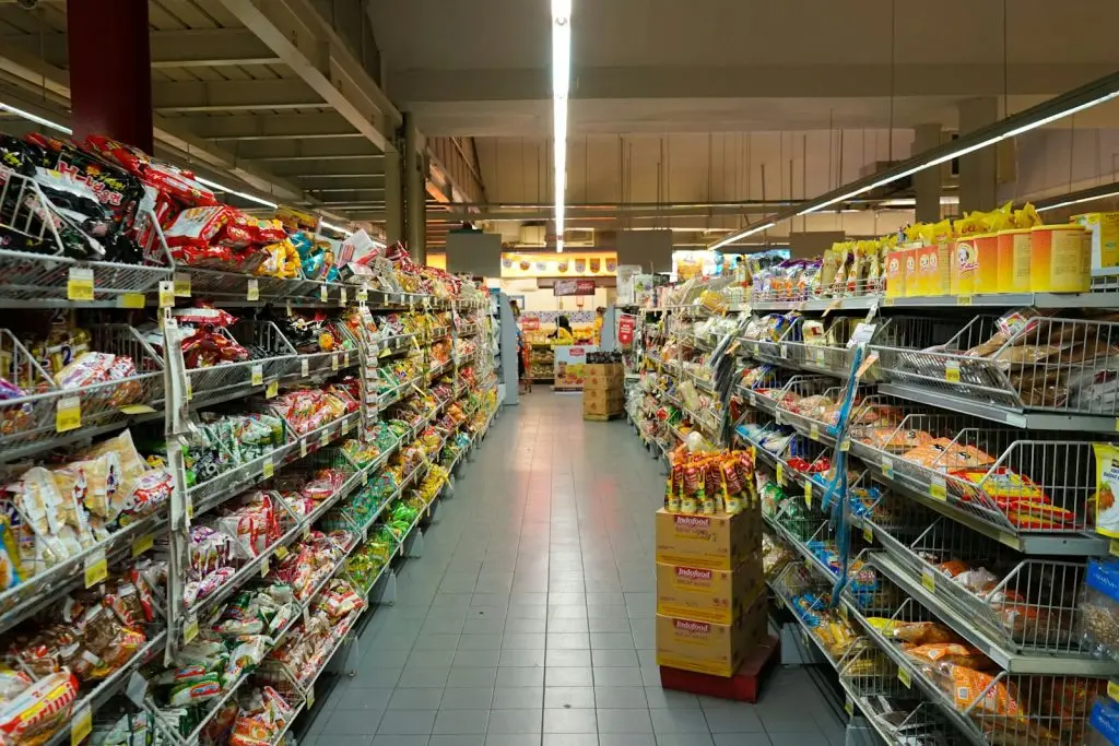 Neatly stocked shelves inside a Canberra mini mart